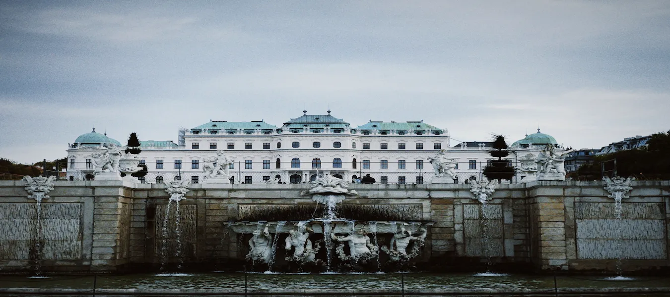 Upper Belvedere Palace with a cascade fountain and stone sculptures in Vienna