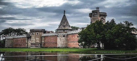 Franzensburg Castle with stone towers beside the lake in Laxenburg Castle Park