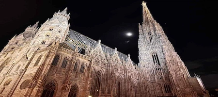 St. Stephen’s Cathedral and its South Tower illuminated at night in Vienna