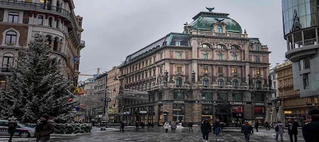 Stephansplatz in Vienna with historic façades and pedestrians on a winter day